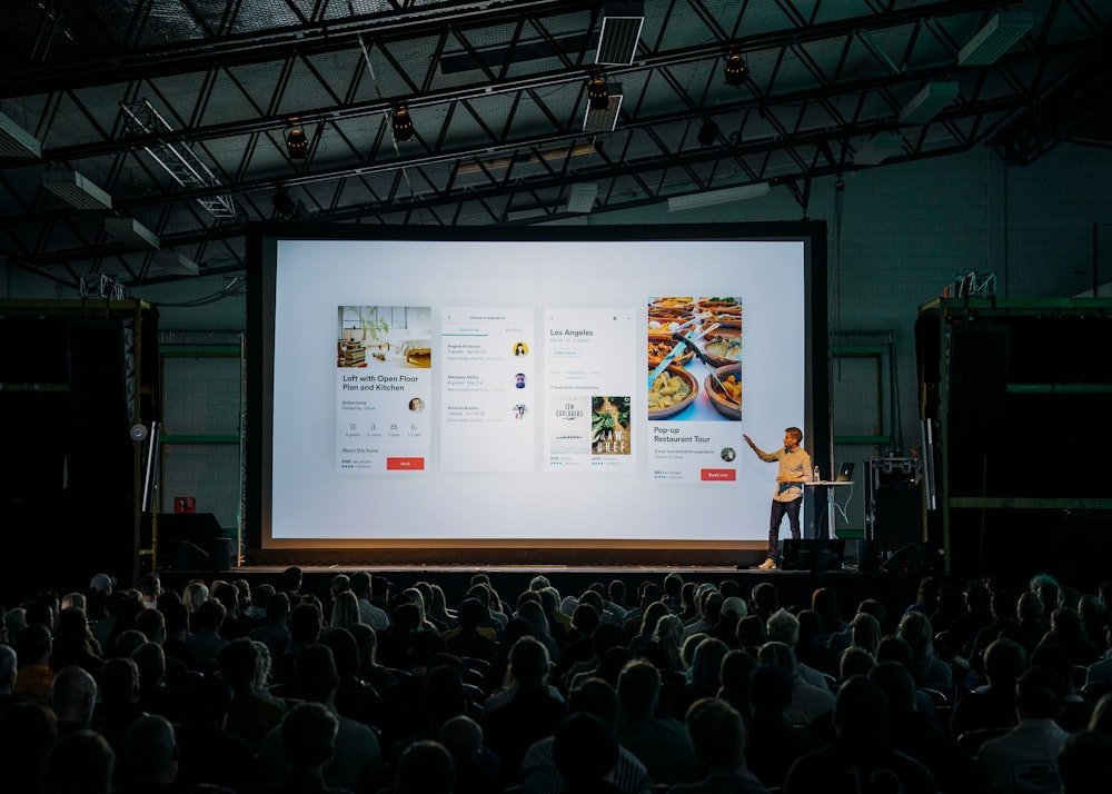 A speaker delivering a tailored keynote