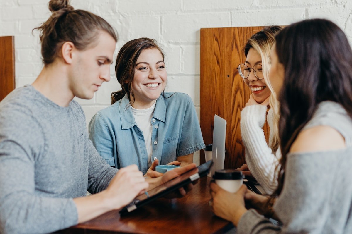 A team watching a speaker showreel